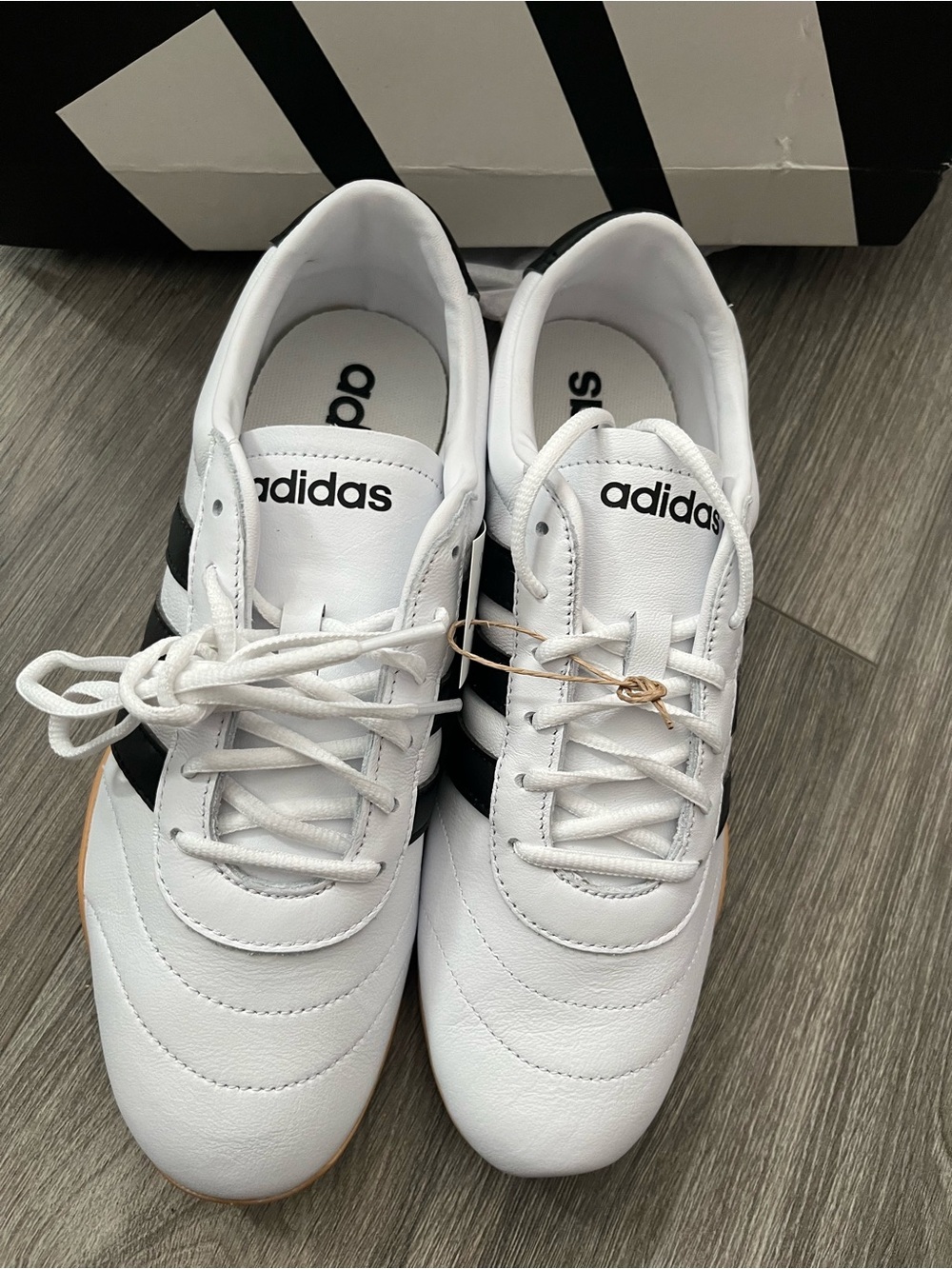adidas courtlo White womens Sneakers with Black Stripes